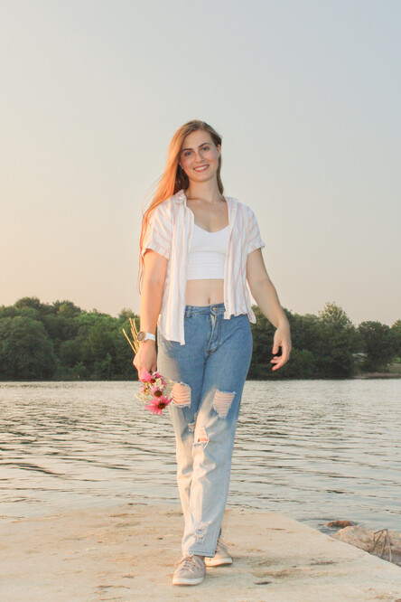 Cass, the photographer behind CassandraMarie Photography, an Omaha wedding photographer