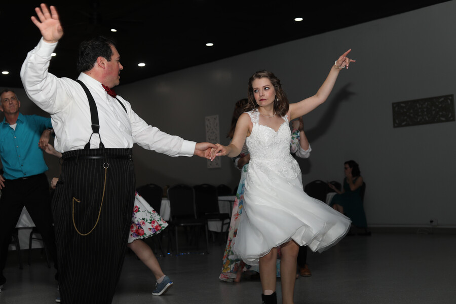 A joyful moment from Bre & Jared's Omaha wedding, captured by CassandraMarie Photography