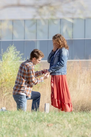 A proposal photo, taken by a light & airy Omaha wedding photographer