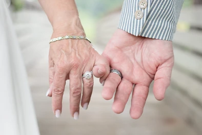 Detail shot of the rings, taken by a light & airy Omaha wedding photographer