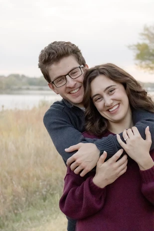 A couple hugging during their Omaha engagement session